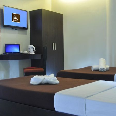 One Hive Hotel And Suites Surigao Exterior photo